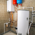 A modern water heater system in a boiler room.